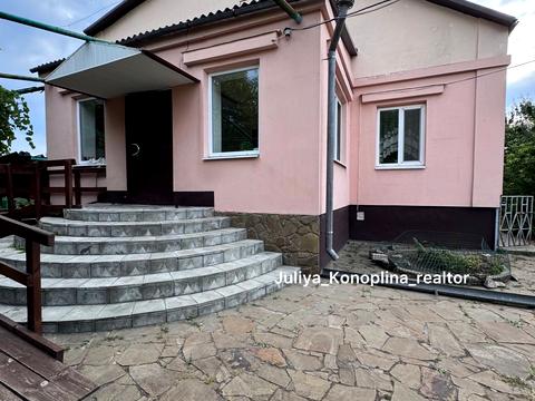 будинок за адресою Тополина