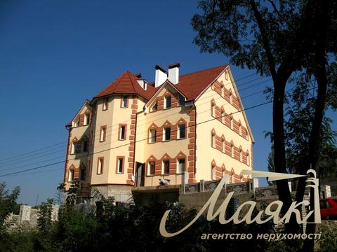 будинок за адресою Ольжича вул.