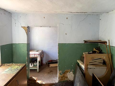 будинок за адресою с. Кузьменка, Центральна
