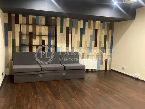 комерційна за адресою Євгена Коновальця вул. (Щорса), 12