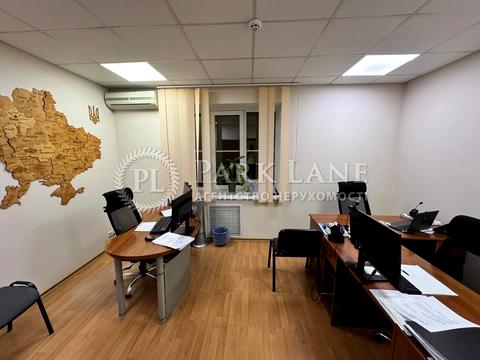 комерційна за адресою Шовковична вул., 7-А