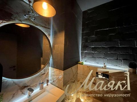 комерційна за адресою Джона Маккейна вул. (Івана Кудрі), 1