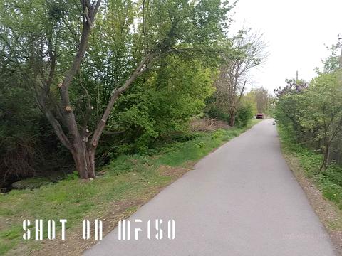 участок по адресу Мельниківська
