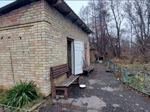 будинок за адресою Зарічна вул. (Народовольців)