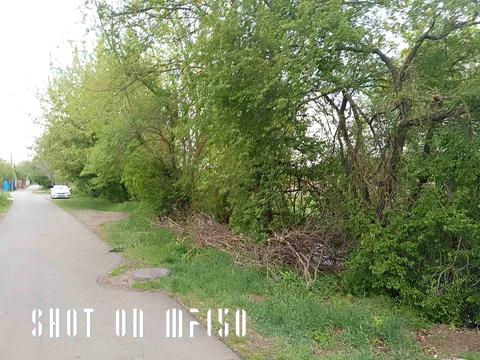 участок по адресу Мельниківська