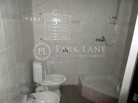 комерційна за адресою Володимирська вул., 77-А