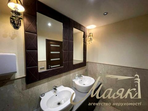 комерційна за адресою Раїси Окіпної вул., 4
