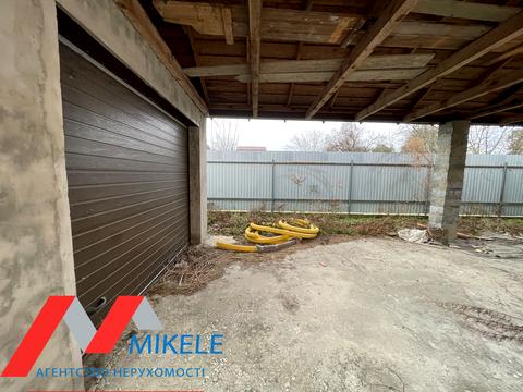 будинок за адресою смт. Козин, 2 лінія, 1