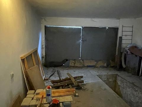 будинок за адресою Коновальця