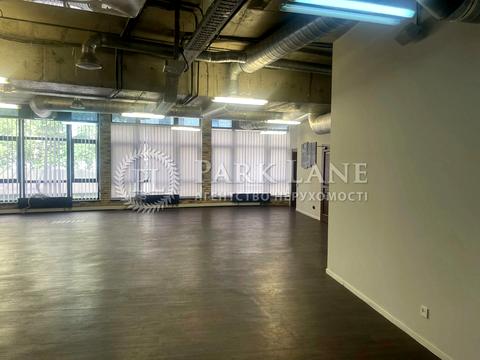 комерційна за адресою Євгена Коновальця вул. (Щорса), 12