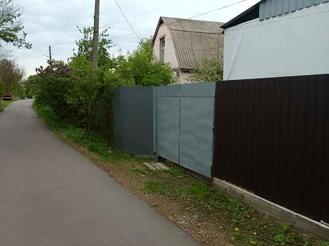 участок по адресу Мельниківська