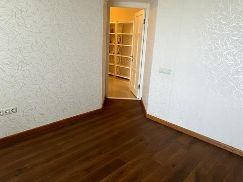 квартира по адресу Строителей ул., 11