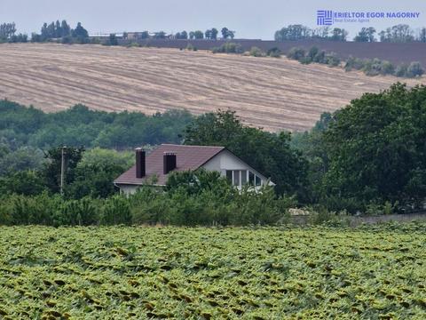 будинок за адресою с. Дніпровське, Козача