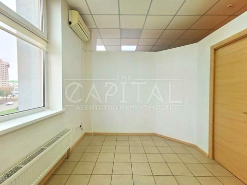 комерційна за адресою Раїси Окіпної вул., 4-Б