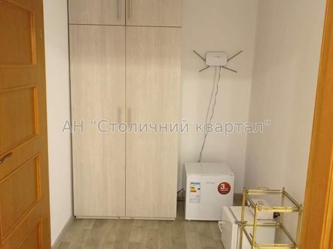 комерційна за адресою Білоруська вул., 10/18