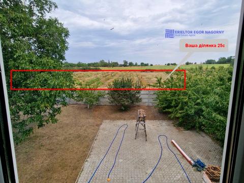 будинок за адресою с. Дніпровське, Козача