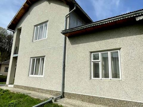 будинок за адресою Коновальця