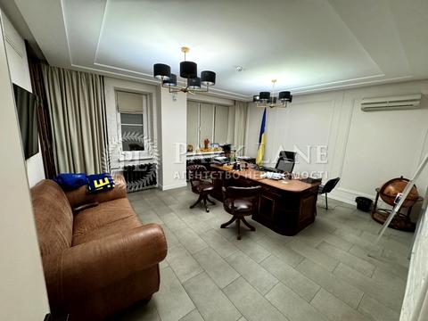 комерційна за адресою Шовковична вул., 7-А