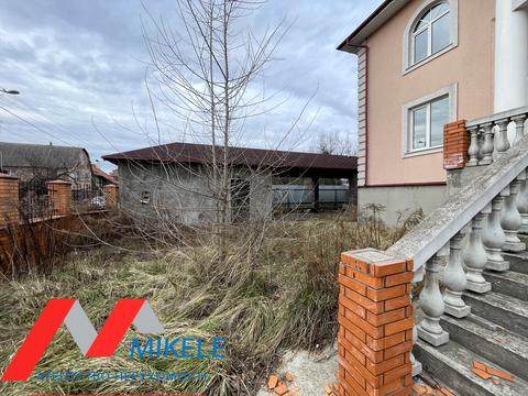 будинок за адресою смт. Козин, 2 лінія, 1