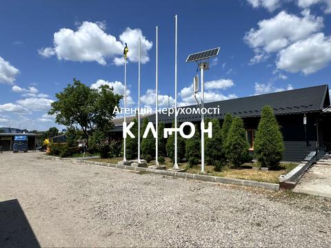 комерційна за адресою Олега Ольжича вул., 48