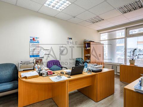 комерційна за адресою Євгена Коновальця вул. (Щорса), 32-Б