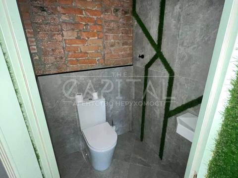 комерційна за адресою Євгена Коновальця вул. (Щорса), 44-А