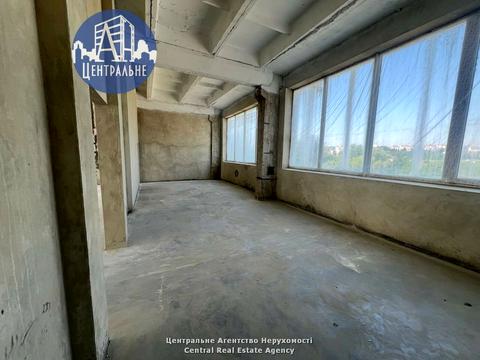 комерційна за адресою Комунальників вул., 2