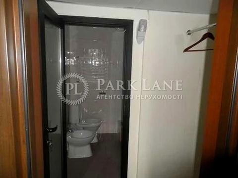 комерційна за адресою Володимирська вул., 77-А