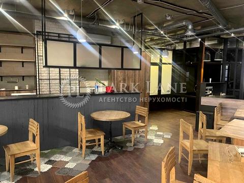 комерційна за адресою Євгена Коновальця вул. (Щорса), 12