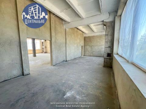 комерційна за адресою Комунальників вул., 2