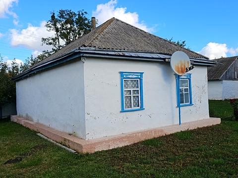 будинок за адресою с. Плужники, Червоноармійська