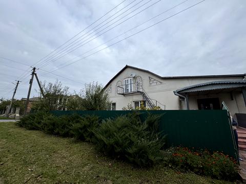 будинок за адресою Євгена Попова