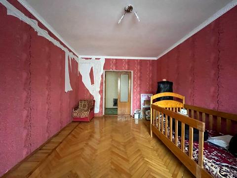 будинок за адресою Євгена Попова