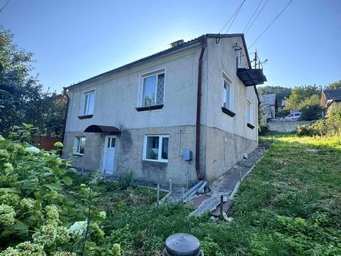 будинок за адресою Бучанська вул. (Курчатова)