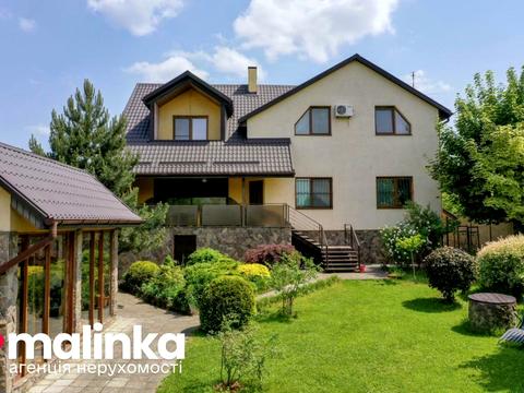 будинок за адресою Шухевича