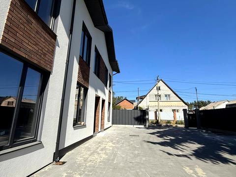 будинок за адресою Сім'ї Шкарівських вул., 9