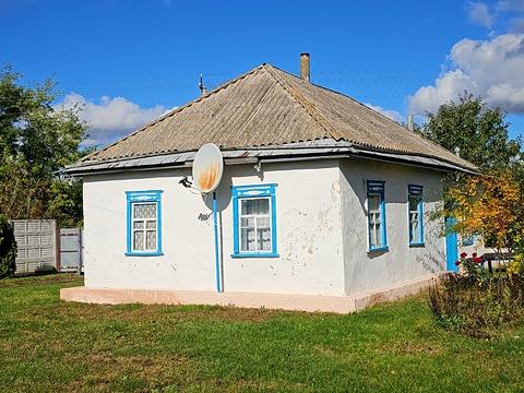 будинок за адресою с. Плужники, Червоноармійська