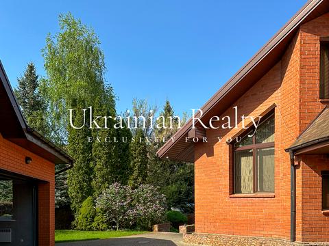 будинок за адресою смт. Козин, Андріївська, 31а