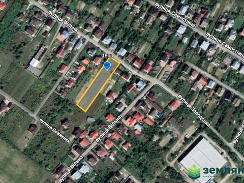участок по адресу Вільна