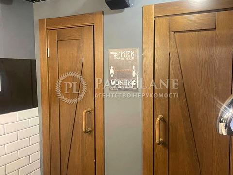 комерційна за адресою Євгена Коновальця вул. (Щорса), 12