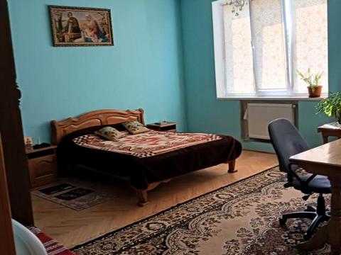 будинок за адресою Євгена Коновальця вул.