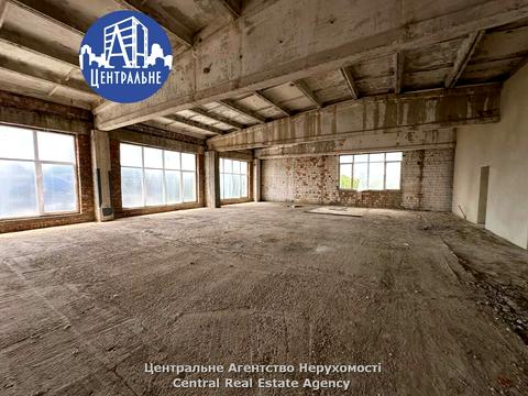 комерційна за адресою Комунальників вул., 2