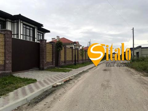 участок по адресу Садовая, 11