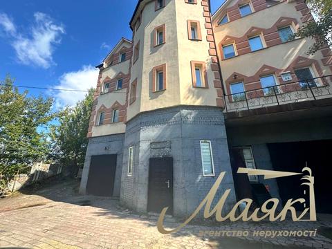 будинок за адресою Ольжича вул.