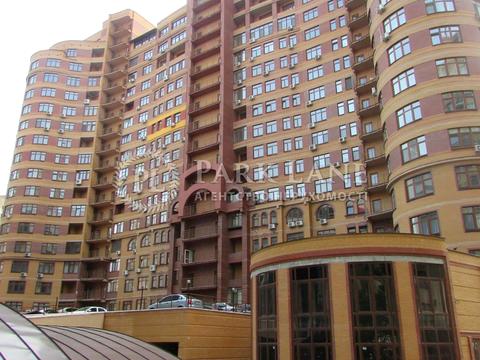 паркомісце за адресою Євгена Коновальця вул. (Щорса), 36-В