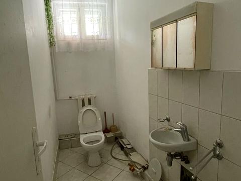 будинок за адресою Коновальця