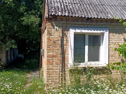 будинок за адресою Тополина вул., 4