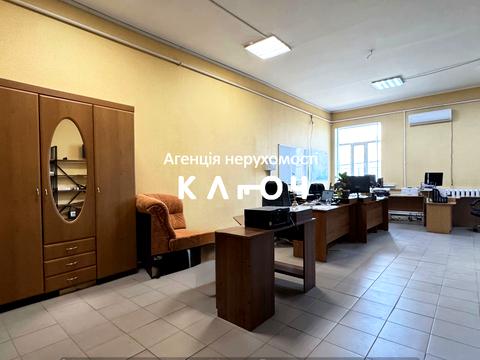 комерційна за адресою Олега Ольжича вул., 48А