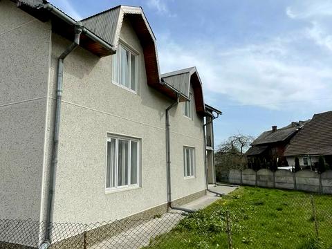 будинок за адресою Коновальця