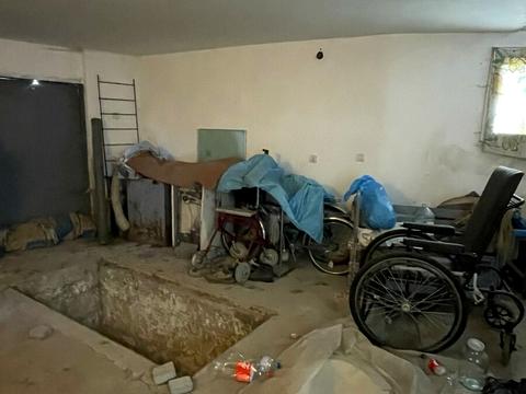 будинок за адресою Коновальця